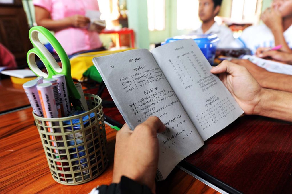 Children study the Mon language at a school near the Shwedagon Pagoda in Yangon. (Steve Tickner | Frontier)