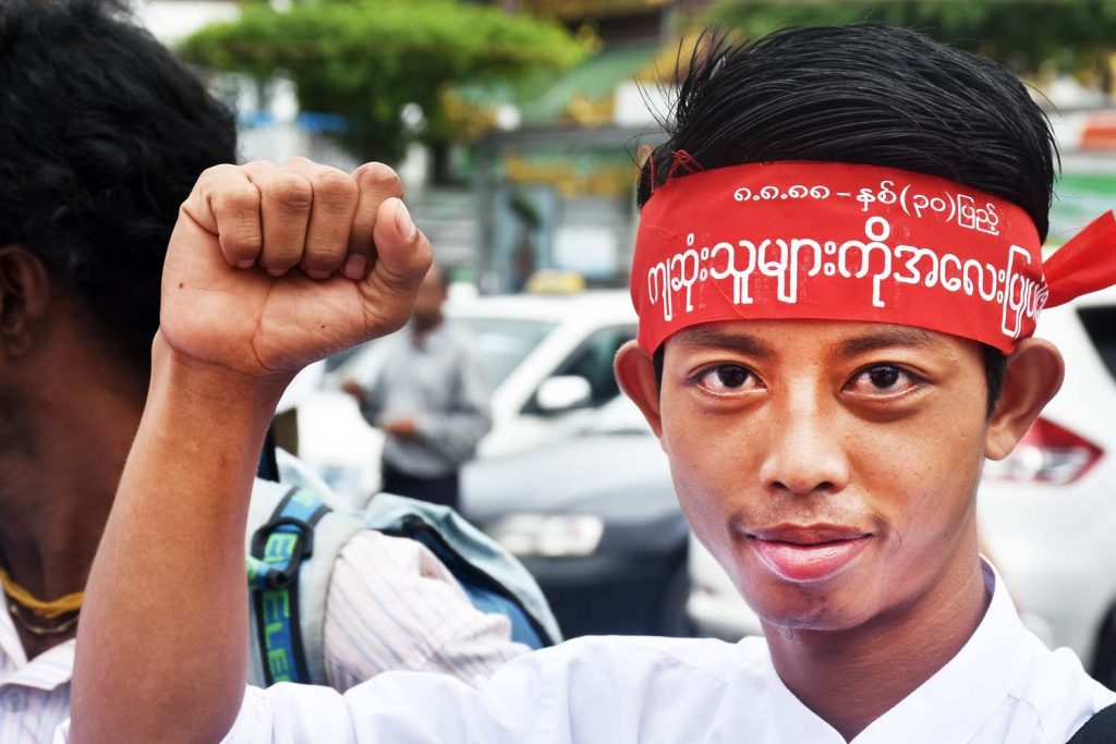 An activist attends an event marking the 30th anniversary of the 1988 uprising on August 8, 2018. (Steve Tickner | Frontier)