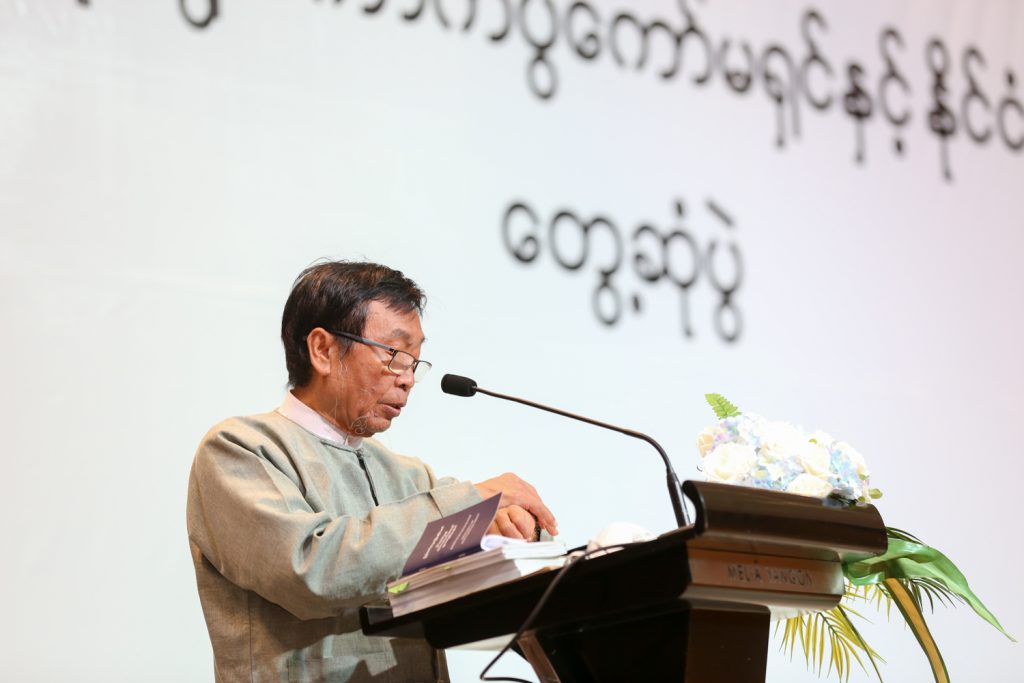 Union Election Commission member U Myint Naing speaks at a meeting with political parties in Yangon on June 27. (Thuya Zaw | Frontier)