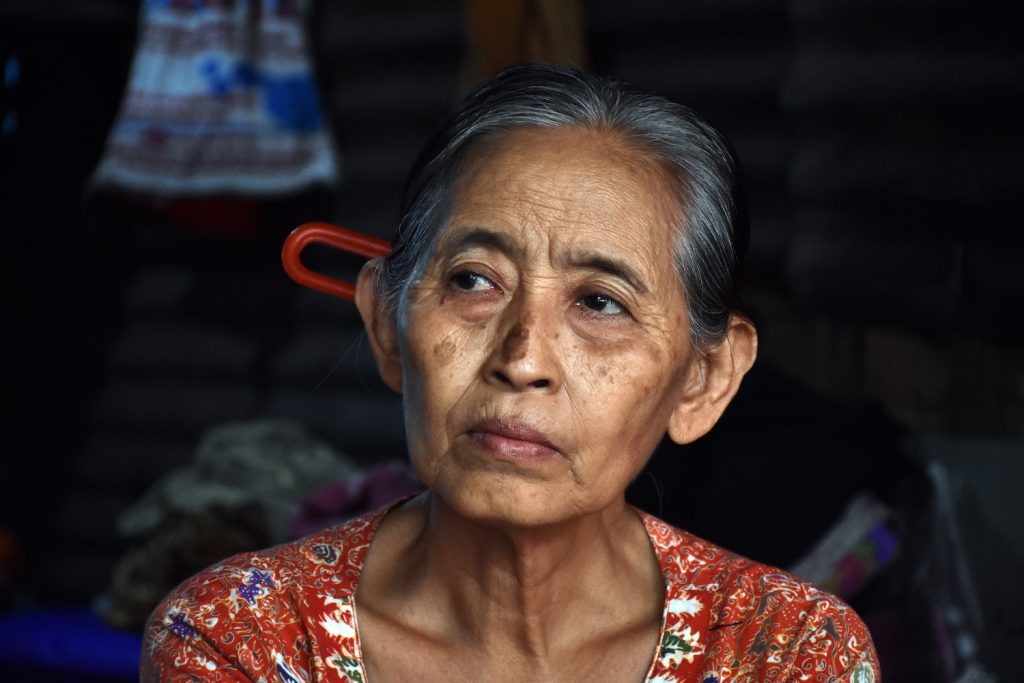 Daw Htay Myint and her daughter moved to Hlaing Tharyar from Ayeyarwady Region in 2011. Htay Myint relies on her daughter's salary to cover all of their costs, including regular medical expeneses. (Steve Tickner | Frontier)