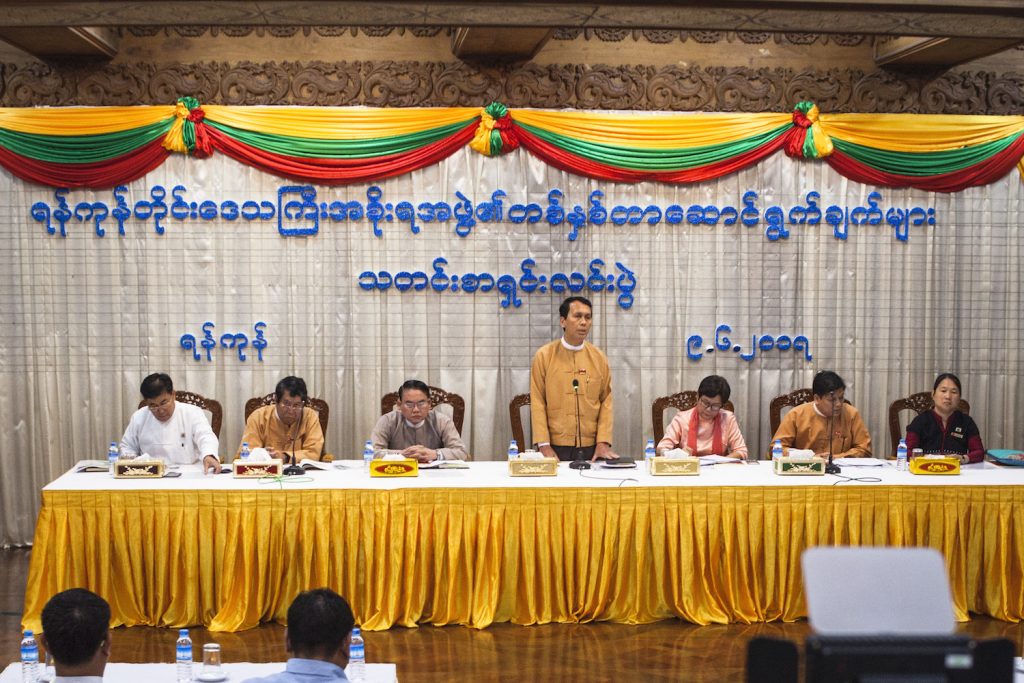 Members of the Yangon Region cabinet, including Karen ethnic affairs minister Naw Pan Thinzar Myo (far right) and Rakhine ethnic affairs minister U Zaw Aye Maung (far left), at a press conference in June 2017. (Theint Mon Soe | Frontier)