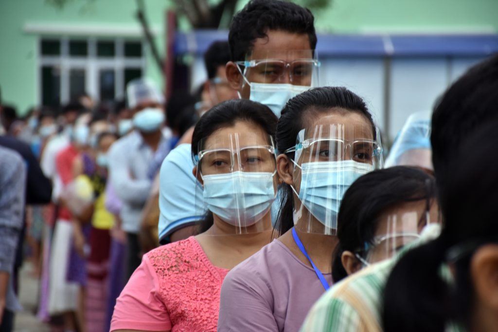 Voters line up to cast their ballot in Yangon's Hlaing Tharyar Township on election day. (Steve Tickner | Frontier)